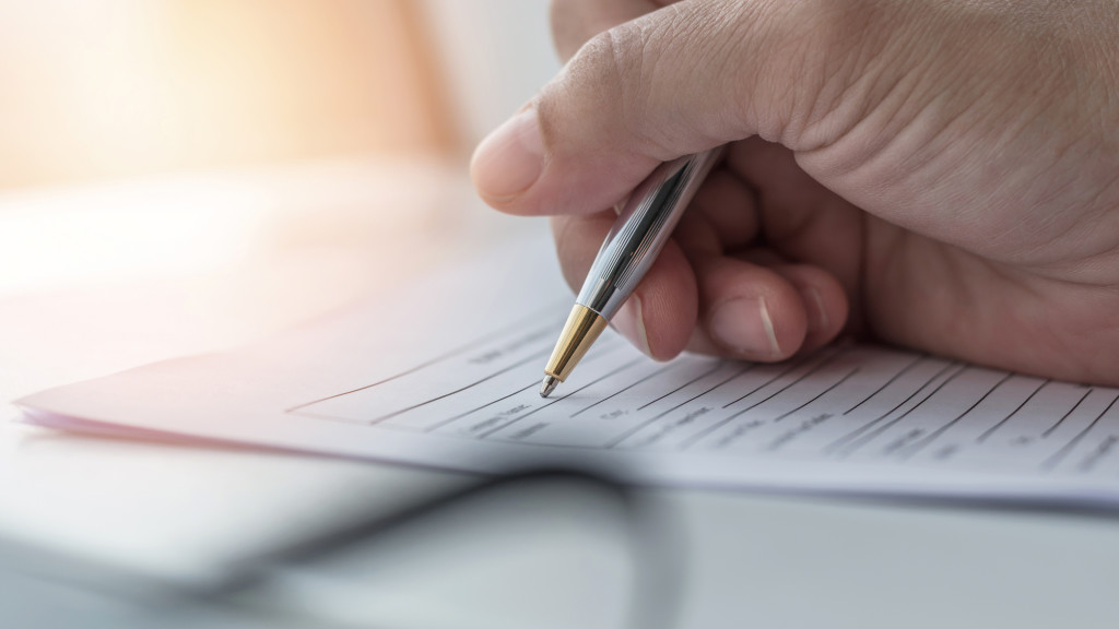 Business application form with applicant filling in company document filing personal profile applying for job, employment opportunity, administrative office career