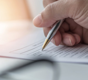 Business application form with applicant filling in company document filing personal profile applying for job, employment opportunity, administrative office career