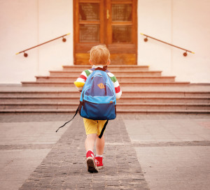 Happy,Smiling,Kid,In,Glasses,Is,Going,To,School,For